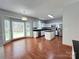Bright, open kitchen with an island, stainless steel appliances, and a cozy breakfast nook at 2609 Lamp Post Ln, Kannapolis, NC 28081