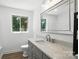 Bathroom with white marble countertop, a modern faucet, and natural lighting from a window at 2705 Lowell Bethesda Rd, Gastonia, NC 28056