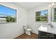 Clean bathroom featuring vinyl floors, a toilet, and a vanity with counter space at 2705 Lowell Bethesda Rd, Gastonia, NC 28056