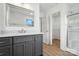 Bathroom featuring gray vanity, modern finishes, and a walk-in closet/shower at 2705 Lowell Bethesda Rd, Gastonia, NC 28056