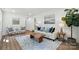 Inviting living room displaying contemporary decor and a blend of textures and patterns at 2705 Lowell Bethesda Rd, Gastonia, NC 28056