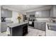 Modern kitchen featuring stainless steel appliances, granite countertops, and an island at 3109 Buckleigh Dr, Charlotte, NC 28215