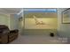 Comfortable living room with projector displaying a bright image at 3109 Buckleigh Dr, Charlotte, NC 28215