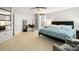 Bright bedroom with carpeted floors, a large bed, and a vanity at 3109 Buckleigh Dr, Charlotte, NC 28215