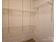 Walk-in closet offering adjustable shelving and ample storage space at 323 Wendover Dr, Locust, NC 28097