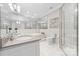 Bathroom featuring double sinks, a soaking tub and glass shower at 3394 Governors Island Dr, Denver, NC 28037