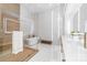 A luxurious bathroom complete with walk-in glass shower, soaking tub and double vanity at 3394 Governors Island Dr, Denver, NC 28037