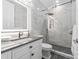 Modern bathroom with white marble walls, a glass shower and LED mirror at 3394 Governors Island Dr, Denver, NC 28037