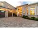 Elegant brick home with a paved driveway and manicured landscaping, offering curb appeal and sophistication at 3394 Governors Island Dr, Denver, NC 28037