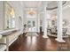 Grand foyer with high ceilings, elegant chandelier, and striking architectural details at 3394 Governors Island Dr, Denver, NC 28037