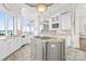 Gourmet kitchen with center island, granite countertops, and lots of natural light at 3394 Governors Island Dr, Denver, NC 28037