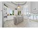 Bright kitchen with a center island, white cabinetry, and natural light at 3394 Governors Island Dr, Denver, NC 28037