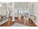 Bright and airy living room featuring waterfront views and elegant hardwood floors at 3394 Governors Island Dr, Denver, NC 28037