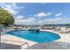 Gorgeous pool area with a hot tub and lake views, perfect for outdoor entertaining at 3394 Governors Island Dr, Denver, NC 28037