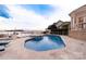 Backyard pool and hot tub with waterfront view and a patio area at 3394 Governors Island Dr, Denver, NC 28037