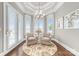 Cozy sitting area with shuttered windows, a round rug and decorative wall art at 3394 Governors Island Dr, Denver, NC 28037