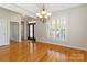 Well-lit dining room with hardwood floors and traditional chandelier at 3624 Ramsey Rd, Sharon, SC 29742