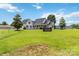 View of home with spacious front yard and 'Rosewood' sign at 3624 Ramsey Rd, Sharon, SC 29742