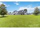 Spacious front yard showcasing the home's ample space and curb appeal at 3624 Ramsey Rd, Sharon, SC 29742