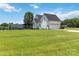 Charming home with a sprawling green lawn, fenced yard, and well-maintained exterior, exuding curb appeal at 3624 Ramsey Rd, Sharon, SC 29742