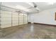 Clean and spacious garage featuring a large overhead door and an additional door for easy access and ample parking at 3624 Ramsey Rd, Sharon, SC 29742