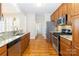 Galley kitchen with stainless steel appliances and granite countertops at 3624 Ramsey Rd, Sharon, SC 29742