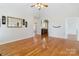 Bright and airy living room with hardwood floors and views of the kitchen at 3624 Ramsey Rd, Sharon, SC 29742