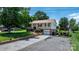 Charming two-story home featuring a well-manicured front lawn and a cozy outdoor seating area at 3651 16Th Ne St, Hickory, NC 28601