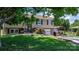 Beautifully landscaped front yard featuring lush greenery, a well-maintained lawn, and a welcoming entrance at 3651 16Th Ne St, Hickory, NC 28601