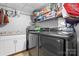 Laundry room featuring modern washer and dryer set, storage cabinet and shelving at 3651 16Th Ne St, Hickory, NC 28601