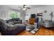 Comfortable living room with a large window, hardwood floors, and stylish furnishings at 3651 16Th Ne St, Hickory, NC 28601