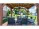 Outdoor pavilion with fire pit, seating, and dining; ideal for entertaining at 3651 16Th Ne St, Hickory, NC 28601