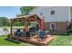 Outdoor gazebo featuring a dining area, a grill, and comfortable seating at 3651 16Th Ne St, Hickory, NC 28601