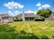 Large, well-manicured backyard featuring a shed and a charming view at 3720 Winterberry Nw Ct, Concord, NC 28027