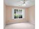 Cozy bedroom offering natural light and neutral carpeting, a tranquil retreat at 3720 Winterberry Nw Ct, Concord, NC 28027
