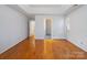 Spacious bedroom featuring hardwood floors, recessed lighting, and natural light at 3720 Winterberry Nw Ct, Concord, NC 28027