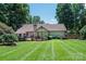 Backyard featuring a gazebo, deck, well-manicured lawn and lush landscaping at 3889 Mattingly Dr, Hickory, NC 28602