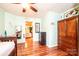 Charming bedroom with hardwood floors, a ceiling fan and neutral color paint at 3889 Mattingly Dr, Hickory, NC 28602