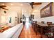 Open-concept living space showcasing hardwood floors, dining area, and seamless flow to the kitchen at 3889 Mattingly Dr, Hickory, NC 28602