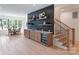 Finished basement with a kitchenette and stairway at 4069 Rivendell Rd, Denver, NC 28037