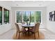 Dining room featuring a round table by a large window at 4069 Rivendell Rd, Denver, NC 28037