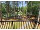 Enjoy stunning lake views from the balcony, overlooking a serene waterway and lush green surroundings at 4069 Rivendell Rd, Denver, NC 28037
