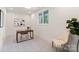 Neutral office space features a bright window view and artist decor at 4069 Rivendell Rd, Denver, NC 28037