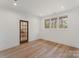 The office space has hardwood floors and a glass-paneled door at 4069 Rivendell Rd, Denver, NC 28037