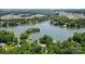 Expansive aerial view of a lake community surrounded by lush greenery and beautiful homes at 4485 River Oaks Rd, Lake Wylie, SC 29710