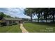 Waterfront home featuring a spacious backyard with a private dock and beautiful lake views at 4485 River Oaks Rd, Lake Wylie, SC 29710