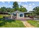 Waterfront home with deck and gazebo, perfect for entertaining and enjoying the lake views in a serene setting at 4485 River Oaks Rd, Lake Wylie, SC 29710