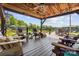 Spacious covered deck with comfortable seating, perfect for entertaining and enjoying panoramic lake views at 4485 River Oaks Rd, Lake Wylie, SC 29710