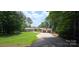 Charming ranch home featuring well-manicured lawn and two-car garage, with stone and siding accents at 4485 River Oaks Rd, Lake Wylie, SC 29710