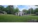 Charming home with a lakeside deck perfect for outdoor dining and relaxation, surrounded by greenery at 4485 River Oaks Rd, Lake Wylie, SC 29710
